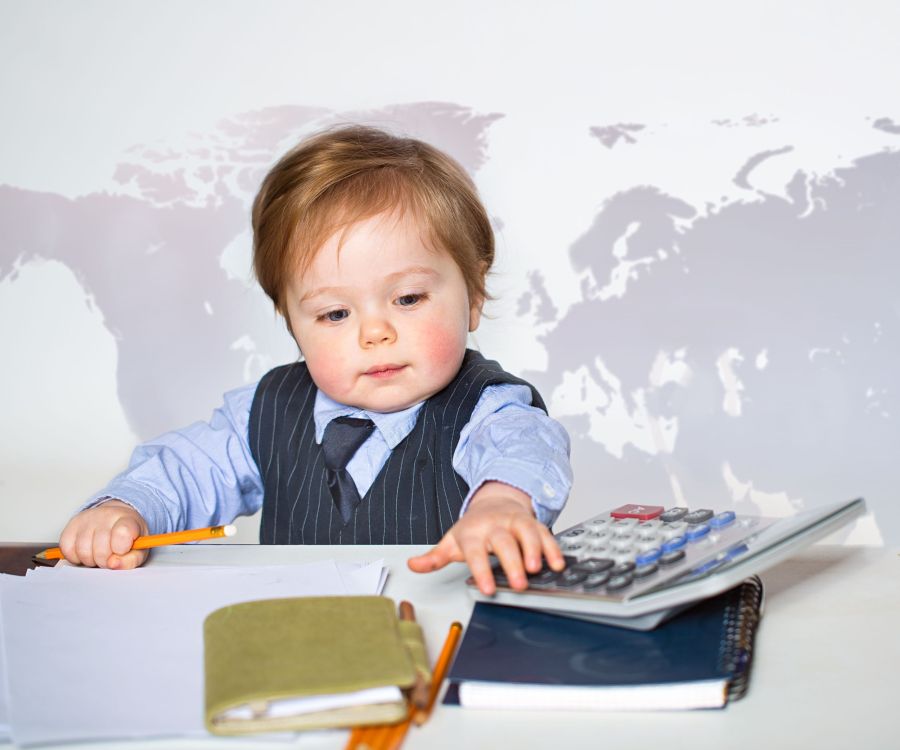 infant with work attire and calculators.jpg
