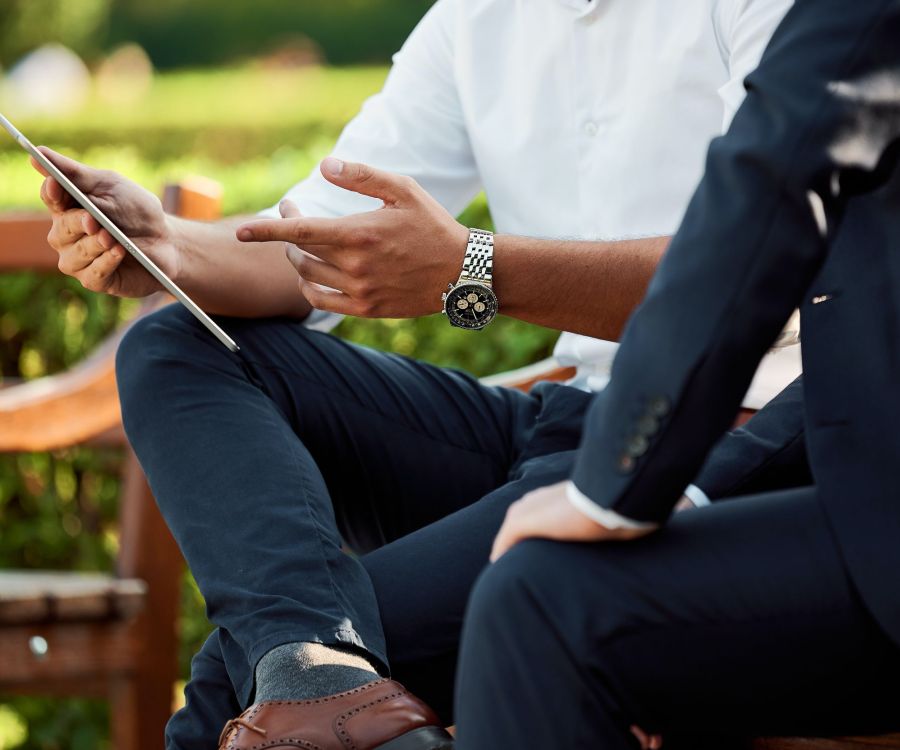 two people viewing a tablet.jpg